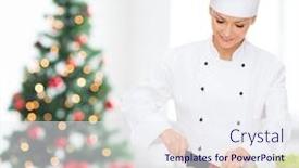  Presentation with christmas food - Amazing theme having cooking holidays people and food concept - smiling female chef chopping vegetables over living room with christmas tree background backdrop and a sky blue colored foreground