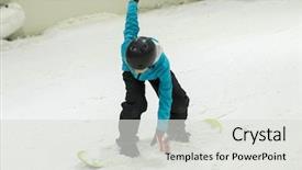  Presentation with snow - Audience pleasing PPT theme consisting of cool slide - young boy riding snowbord backdrop and a  colored foreground