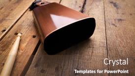  Presentation with musical instrument - Colorful presentation theme enhanced with copper-cowbell-musical-instrument backdrop and a tawny brown colored foreground