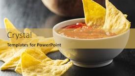  Presentation with dip - Presentation consisting of corn nacho chips and tomato dip yellow tortilla chips and salsa on black table background and a yellow colored foreground