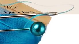  Presentation with needle - Presentation with cotton reel with pin needle and thread background and a coral colored foreground