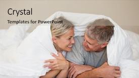  Presentation with bed - Beautiful presentation theme featuring couple lying down in their bed at home backdrop and a soft green colored foreground