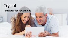  Presentation with bed - PPT layouts consisting of couple lying on bed using their tablet pc in bedroom background and a light gray colored foreground
