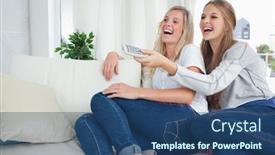  Presentation with television - PPT theme with couple of girls laughing as they watch television background and a ocean colored foreground