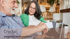  Presentation with credit card - Theme featuring couple-of-seniors-with-credit background and a coral colored foreground