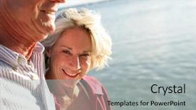  Presentation with seniors - Audience pleasing PPT layouts consisting of couple of smiling seniors having a walk by the edge of the sea backdrop and a light gray colored foreground