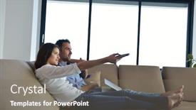  Presentation with remote - Slides with tv computer light - couple on sofa with tv background and a gray colored foreground