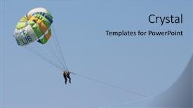  Presentation with parasailing - Theme featuring couple parasailing off the beach background and a light blue colored foreground