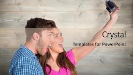  Presentation with bleached - Slides having couple taking selfie with digital camera against bleached wooden planks background background and a soft green colored foreground