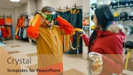  Presentation with ski - Presentation theme with couple trying on mask for ski or snowboarding background and a coral colored foreground