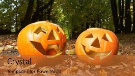  Presentation with creepy - Amazing theme having creepy carved pumpkin face with a smile in park backdrop and a red colored foreground