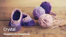  Presentation with crochet - PPT theme having crochet baby booties background and a coral colored foreground