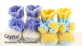  Presentation with crocheted - Presentation having crocheted booties for baby isolated on white background and a yellow colored foreground