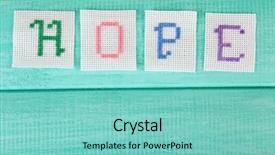  Presentation with stitch - Audience pleasing PPT theme consisting of cross stitch - word made embroidered letters backdrop and a seafoam green colored foreground