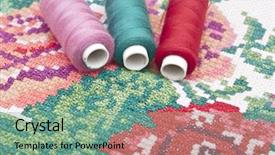  Presentation with stitch - Beautiful PPT theme featuring cross-stitch set colorful threads and canvas backdrop and a seafoam green colored foreground
