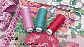  Presentation with stitch - Audience pleasing slide set consisting of cross-stitch set colorful threads and canvas backdrop and a coral colored foreground