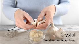  Presentation with herbal medicine garlic - Colorful theme enhanced with crusher plant - woman peeling garlic at table backdrop and a coral colored foreground