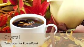  Presentation with tea leaves - Amazing theme having cup and pot of hot orange pekoe tea surrounded by autumn leaves backdrop and a soft green colored foreground