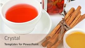  Presentation with black tea - Theme with cup of black tea from cowberry and mint with cinnamon sticks and honey background and a coral colored foreground