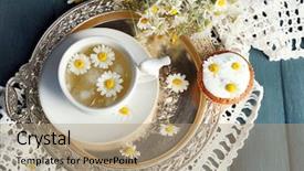  Presentation with muffins - Audience pleasing PPT theme consisting of cup of chamomile tea backdrop and a coral colored foreground