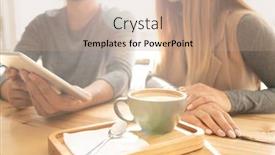  Presentation with cappuccino - Colorful presentation enhanced with cup of fresh cappuccino and spoon on wooden tray on background of young couple using touchpad in cafe backdrop and a coral colored foreground