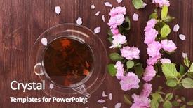  Presentation with pink roses - PPT theme having cup of herbal tea with pink roses on wooden table top view background and a tawny brown colored foreground