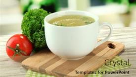  Presentation with soup - PPT theme consisting of cup of soup on wooden table background and a coral colored foreground