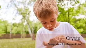  Presentation with summer holiday - Theme having curious-boy-examining-dandelion-standing background and a coral colored foreground