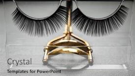  Presentation with eyelashes - Slide set consisting of curler and false eyelashes on table background and a light gray colored foreground