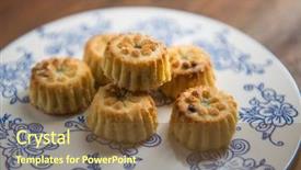  Presentation with popular - PPT theme featuring cusine - popular middle eastern sweet maamoul background and a tawny brown colored foreground