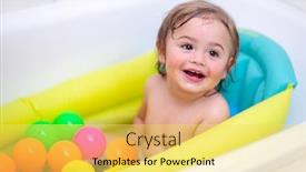  Presentation with childcare - Presentation design enhanced with cute baby boy bathing in the little children's bath and with pleasure playing with colorful balls in it hygiene and childcare concept background and a yellow colored foreground