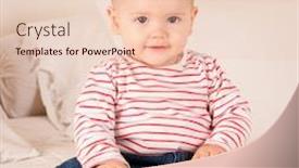  Presentation with baby sitting - Audience pleasing PPT theme consisting of cute baby boy in jeans and striped t-shirt sitting on a bed backdrop and a lemonade colored foreground