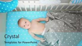  Presentation with cute baby - Presentation theme enhanced with cute baby lying in bed background and a arctic colored foreground