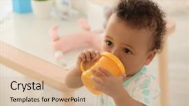  Presentation with baby bottle - Colorful PPT theme enhanced with baby with bottle of water backdrop and a coral colored foreground