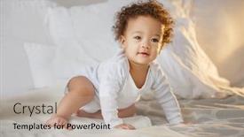  Presentation with cute baby - PPT theme consisting of cute-baby-with-fluffy-hair background and a mint green colored foreground