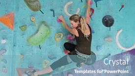  Presentation with safety - PPT theme with cute blonde girl in activewear and safety belt on hips keeping feet on multi-color rocks and grabbing by them during climbing practice in gym background and a teal colored foreground