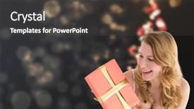  Presentation with shimmering - Theme featuring cute blonde holding a gift against shimmering christmas tree of lights background and a dark gray colored foreground