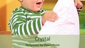  Presentation with cute - PPT theme having cute caucasian toddler shows his drawn picture in kindergarten background and a mint green colored foreground