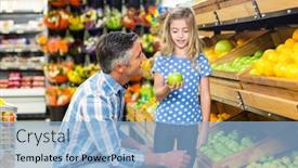  Presentation with grocery - Audience pleasing PPT theme consisting of cute child holding a green apple in the grocery shop with her father backdrop and a light blue colored foreground