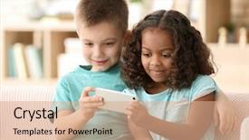  Presentation with children adoption - PPT theme consisting of cute children with smartphone indoors background and a coral colored foreground
