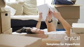  Presentation with album - PPT layouts having cute-couple-unpacking-cardboard-boxes background and a coral colored foreground