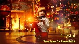  Presentation with railway - Presentation design consisting of cute five-year-old boy playing with a toy railway near the christmas tree christmas night christmas decoration background and a tawny brown colored foreground