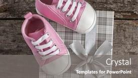  Presentation with baby shoes - PPT theme enhanced with cute little baby shoes on wood background top view background and a gray colored foreground