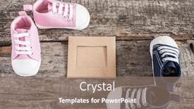  Presentation with baby shoes - Presentation theme enhanced with cute little baby shoes on wood background top view background and a gray colored foreground