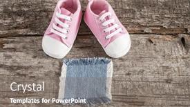  Presentation with baby shoes - Amazing presentation theme having cute little baby shoes on wood background top view backdrop and a gray colored foreground