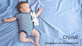 Presentation with sleeping baby - Audience pleasing PPT theme consisting of cute little baby sleeping backdrop and a light blue colored foreground