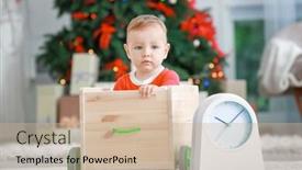  Presentation with clock countdown - Beautiful presentation featuring cute little baby with toy cart and clock at home christmas countdown concept backdrop and a soft green colored foreground