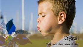  Presentation with pinwheel - Presentation enhanced with wind energy close up portrait - cute little boy blowing background and a coral colored foreground