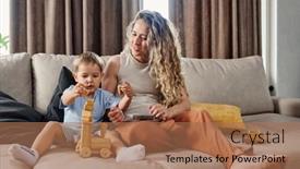  Presentation with wooden toy - Presentation design with cute-little-boy-putting-stack background and a coral colored foreground