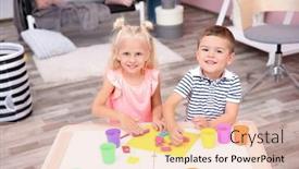  Presentation with playdough - PPT theme having cute little children modeling from playdough at home background and a lemonade colored foreground